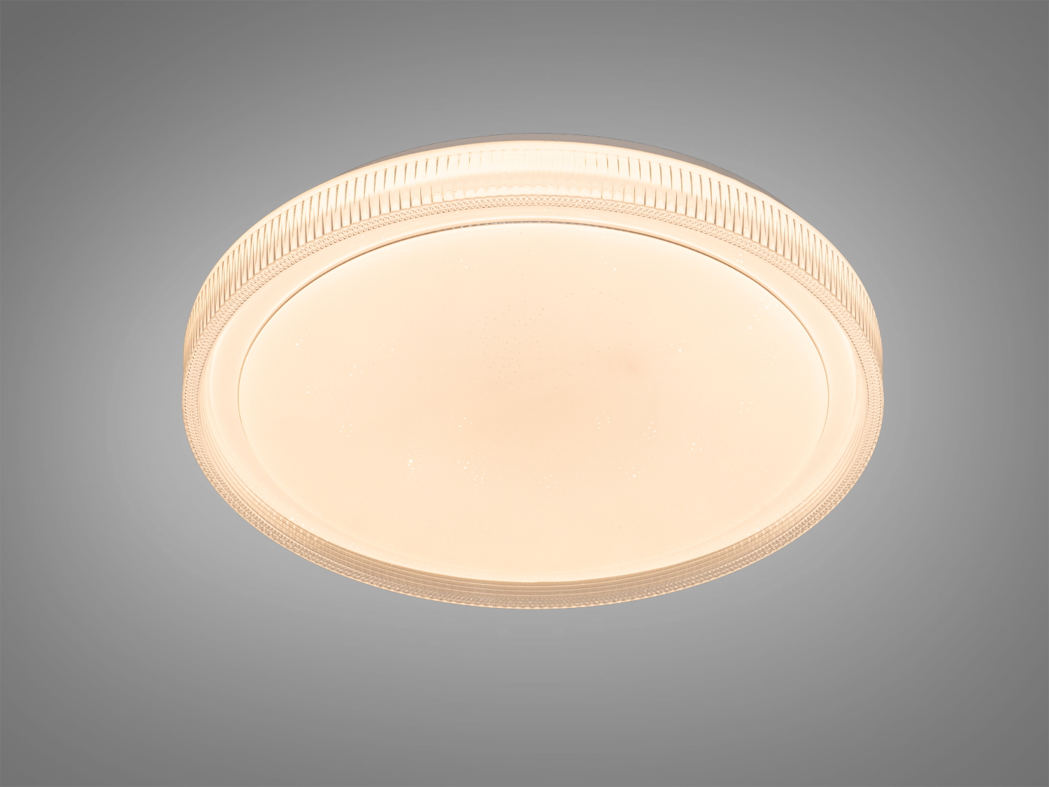 Стельовий світильник з теплим жовтим світлом, круглої форми, з прозорим обідком. Ідеально підходить для затишних інтер′єрів.