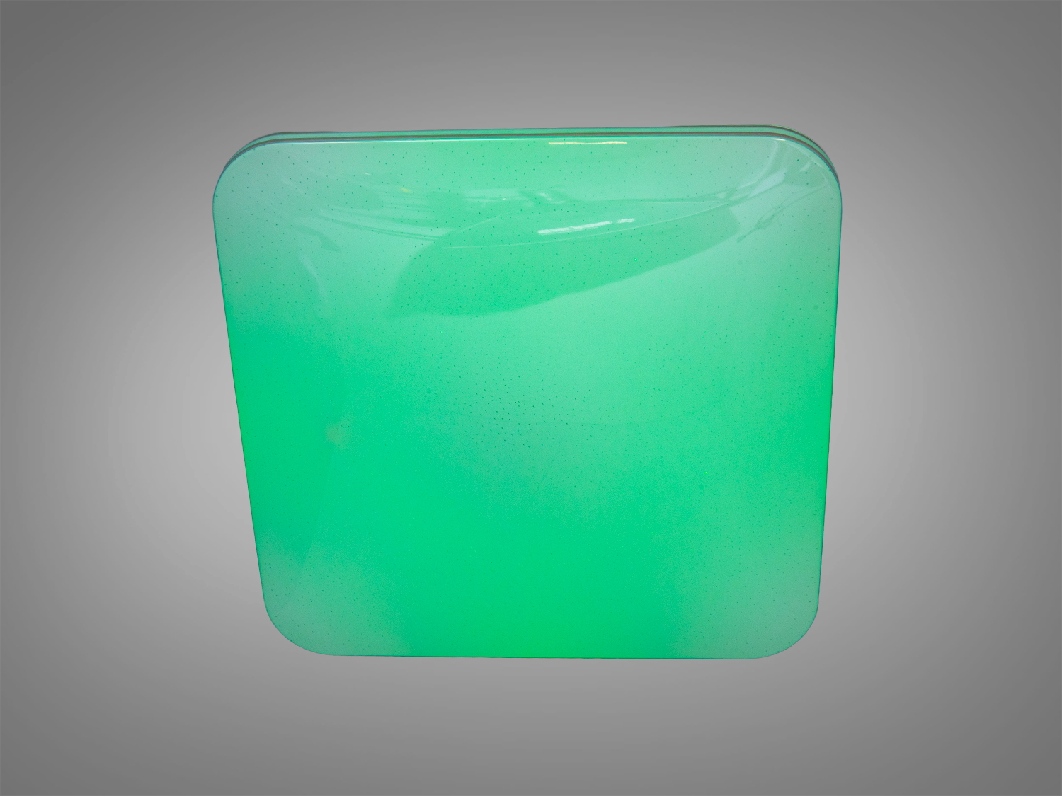 Квадратна стельова лампа з зеленим світлом, виготовлена з пластику, ідеальна для створення затишної атмосфери в кімнаті.