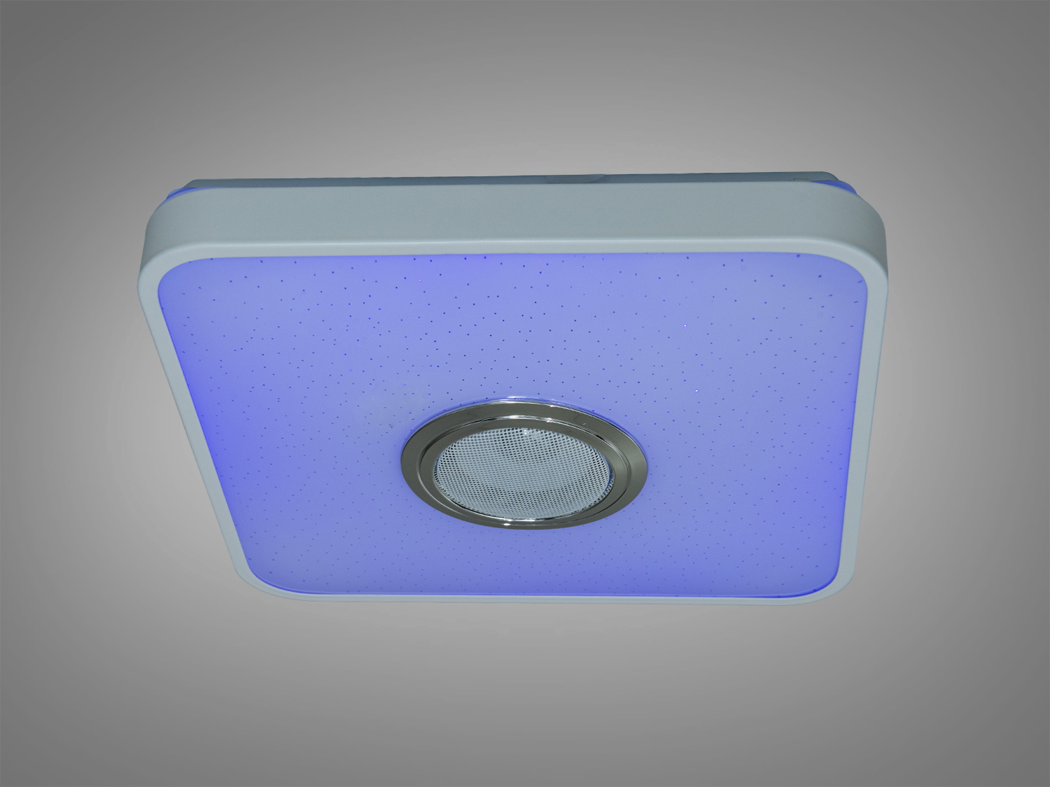 Квадратний світильник з синім підсвічуванням, оснащений динаміком для музичного супроводу.