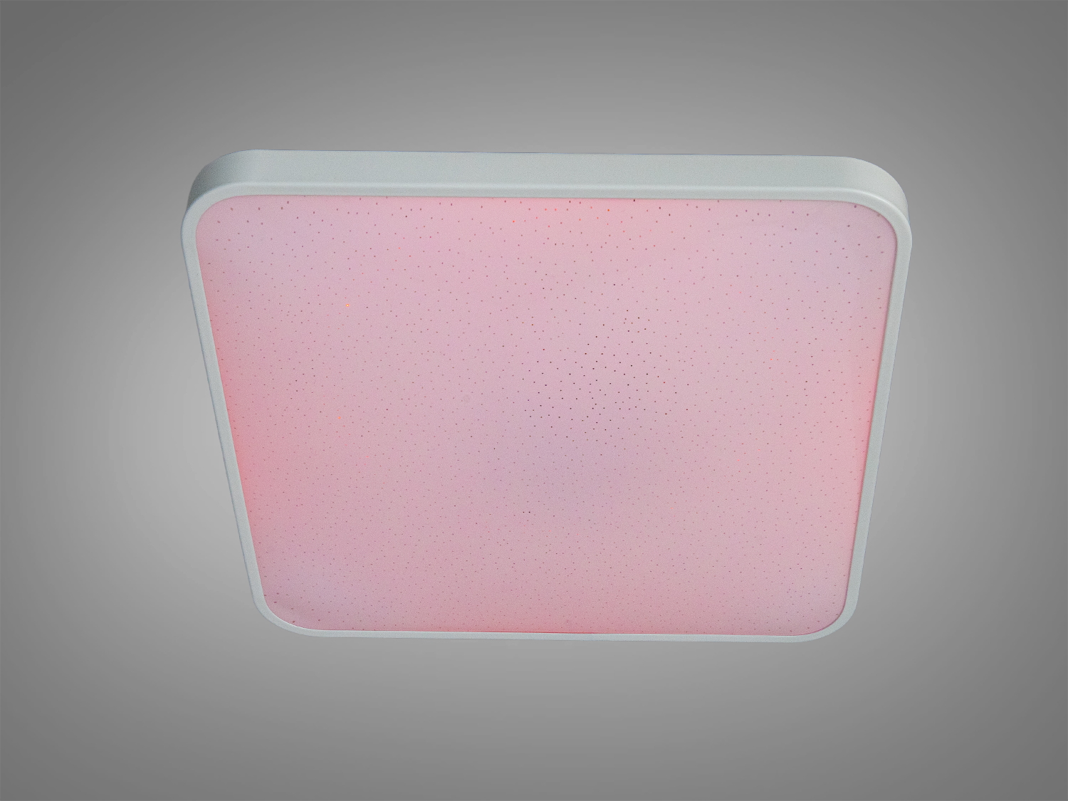 Квадратний світильник з ніжним рожевим світлом, призначений для стельового монтажу, створює затишну атмосферу.