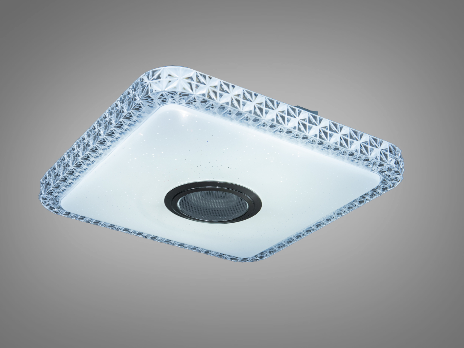 Світильник квадратної форми з рельєфною рамкою, що створює ефект кришталю. Вбудований динамік для звукового супроводу.