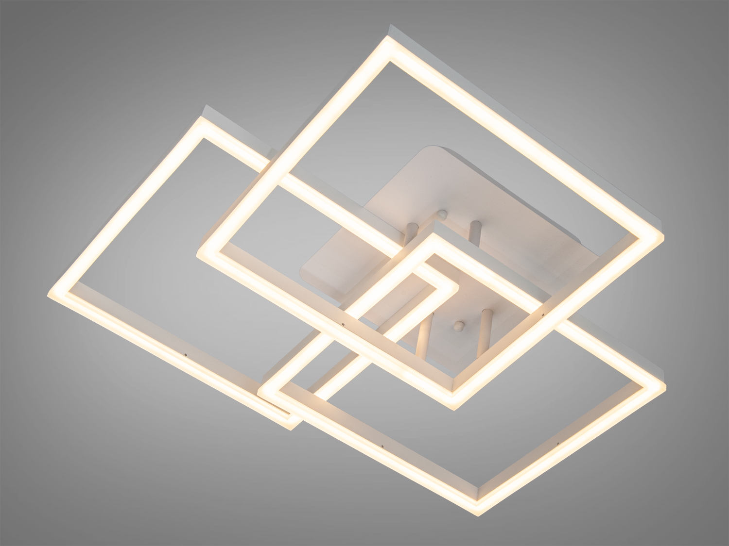 Світильник з теплим білим світлом, що підкреслює геометричні форми квадратів. Підходить для затишних житлових зон.