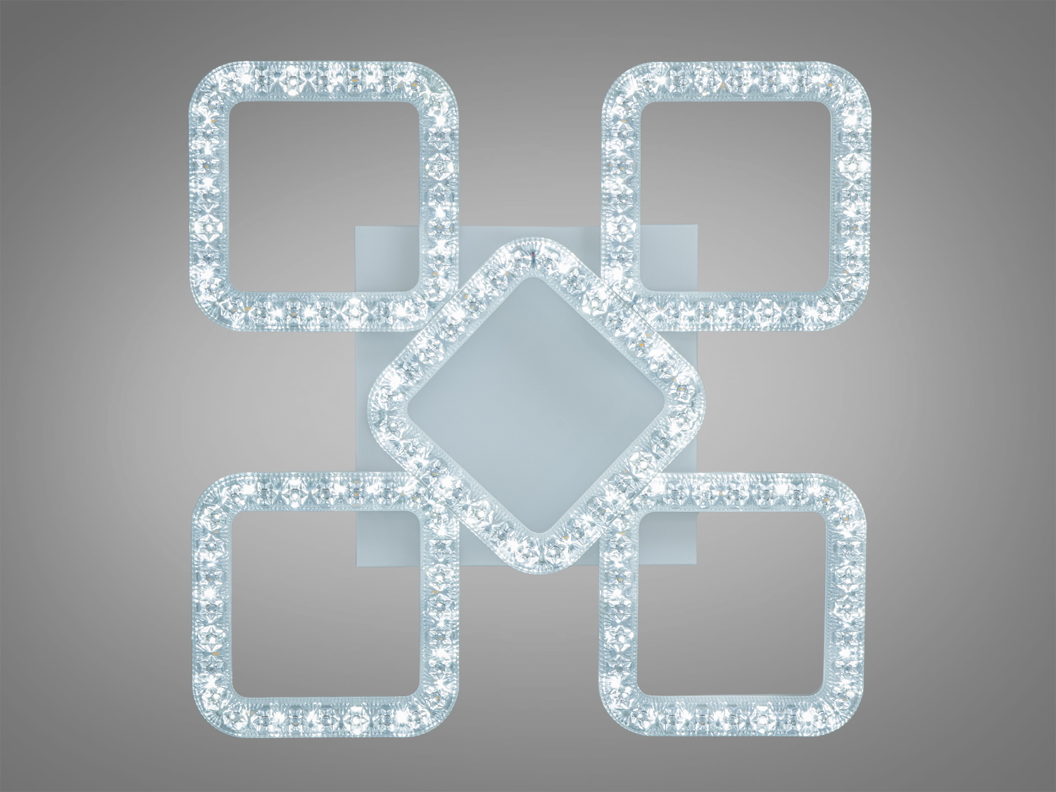 Декоративний світильник з центральним ромбом та пятьма квадратами, що випромінюють холодне біле світло. Підходить для офісів.