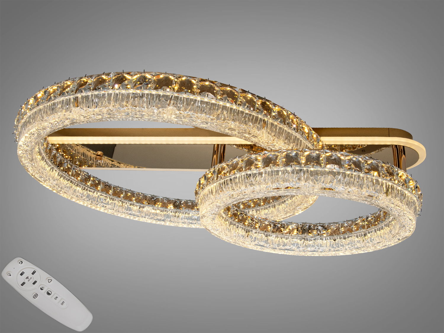 Світильник з двома переплетеними акриловими кільцями. В комплекті пульт дистанційного керування для регулювання яскравості.