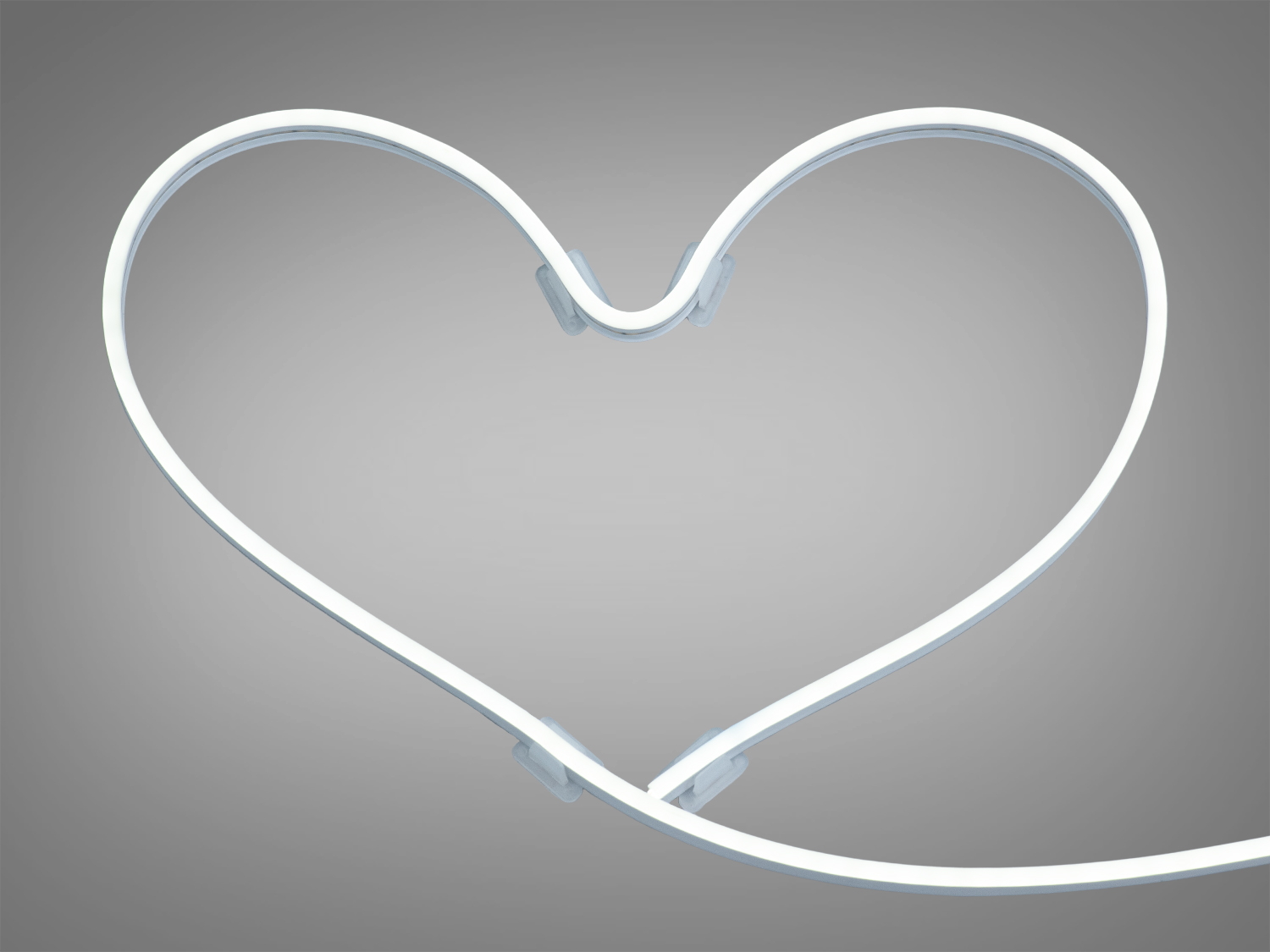 Світлодіодний неон у формі серця для романтичного декору інтер′єру. Виготовлений з гнучкого матеріалу для зручного монтажу.