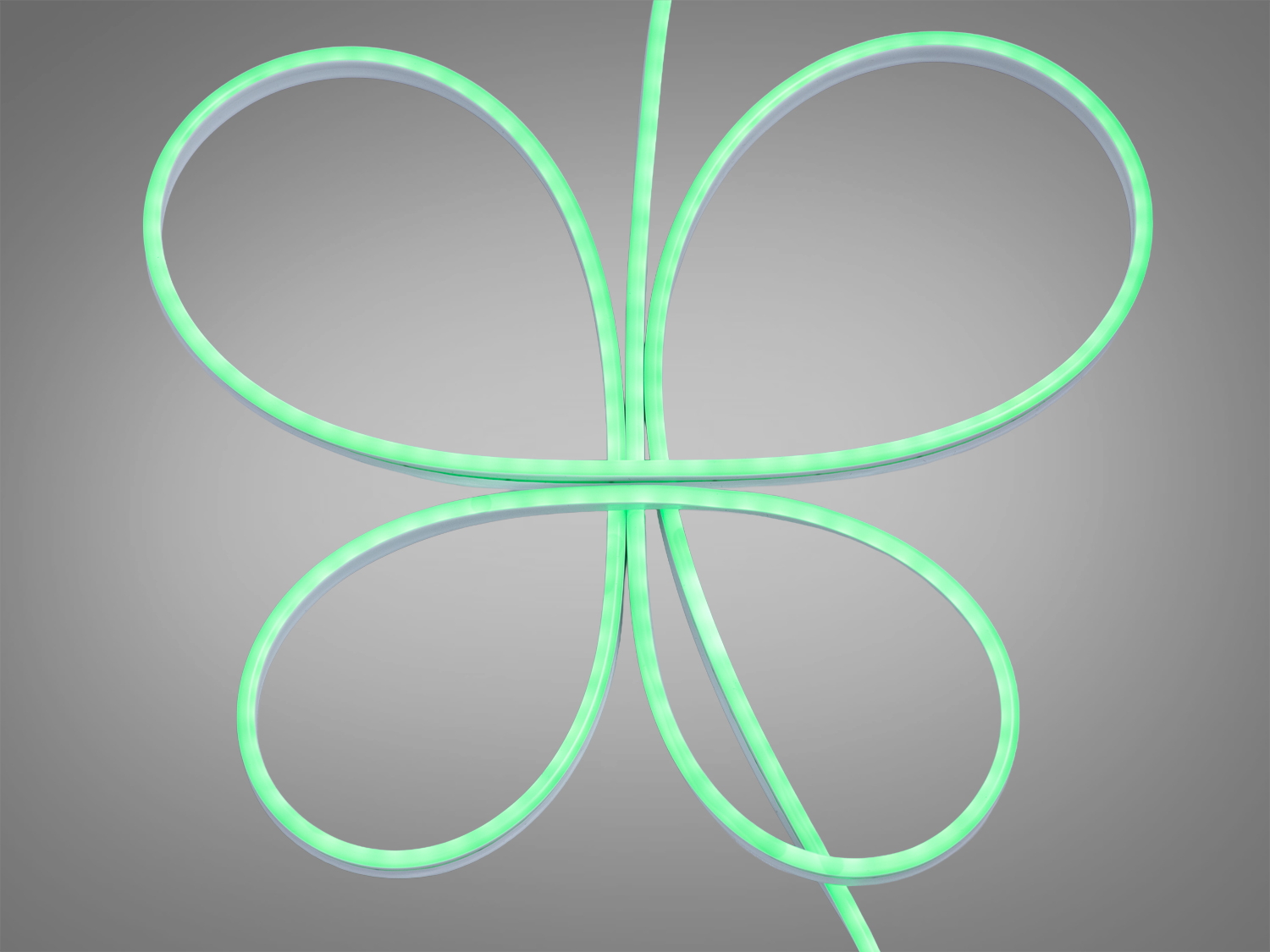 Світлодіодна стрічка у формі петлі, з рівномірним зеленим світлом, ідеальна для декоративного освітлення вітальні чи офісу.