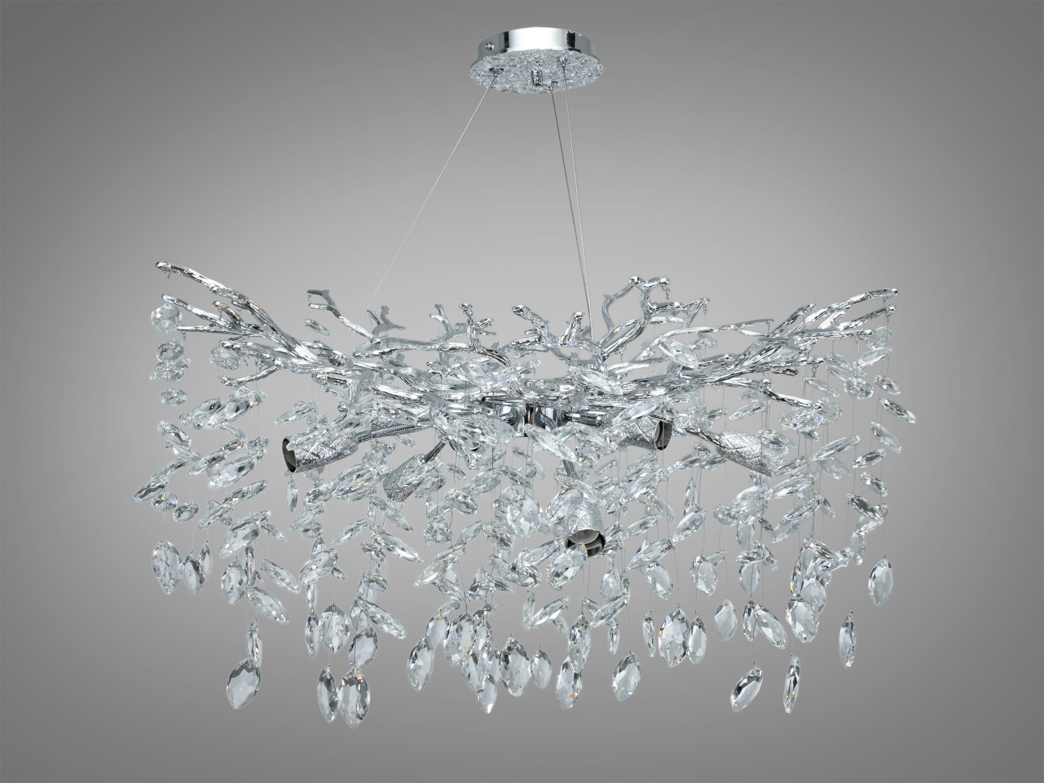 Кришталева підвісна люстра Гліцинія у хромі з 10 патронами E14 і регульованою висотою. Підходить для освітлення кімнат до ≈20 м². Монтаж на планку, керування настінним вимикачем.