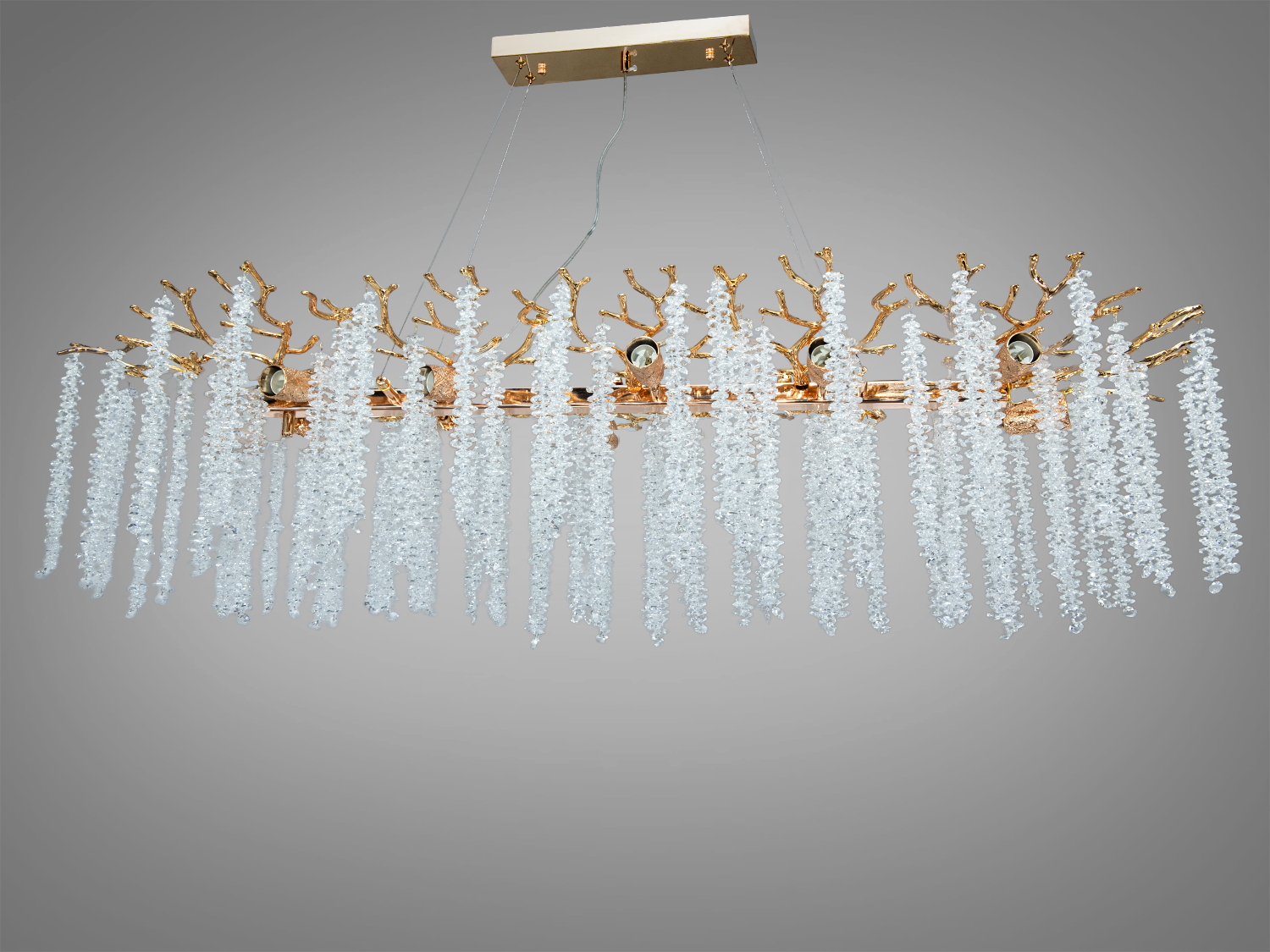 Підвісна кришталева люстра «Гліцинія» у золоті, 12xE14. Витягнута форма, регульована висота, монтажна планка. До ~25 м², алюмінієвий каркас, керування від вимикача. Варіант — хром.