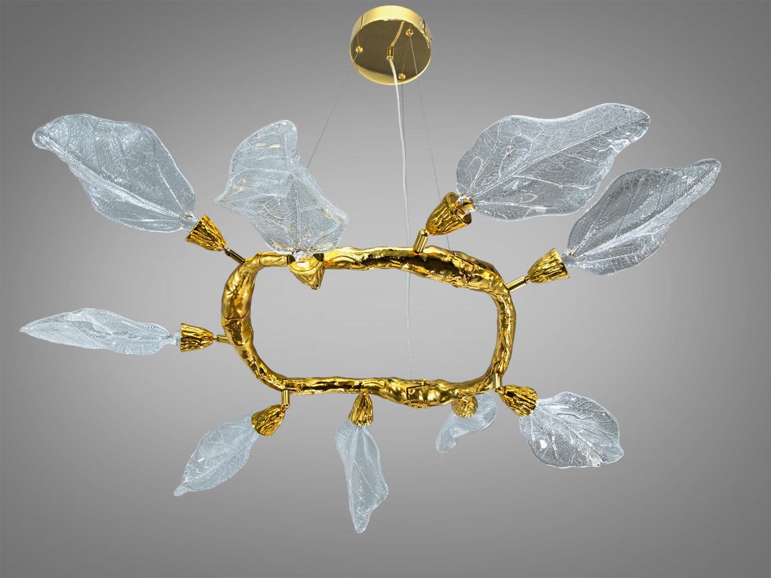 Підвісна люстра з прозорими  плафонами у формі листя, розташованими по колу на золотистій основі. Підходить для вітальні.