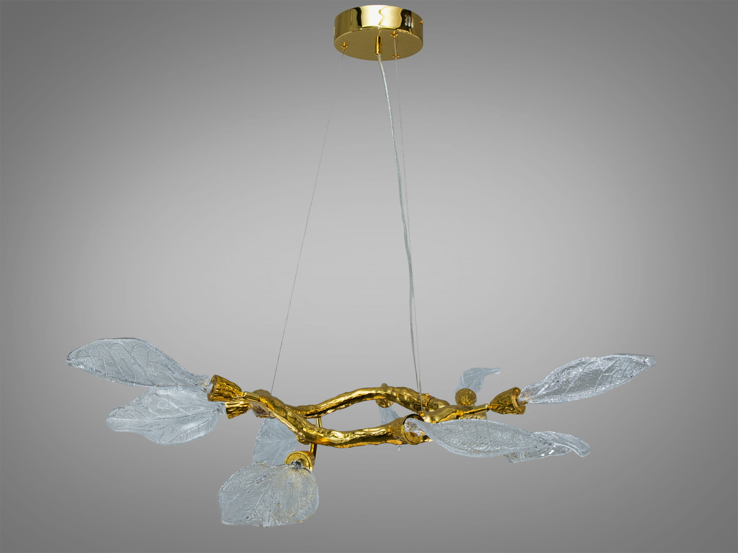 Підвісна люстра з прозорими  плафонами у формі листя, закріпленими на вигнутій золотистій основі. Підходить для спальні.
