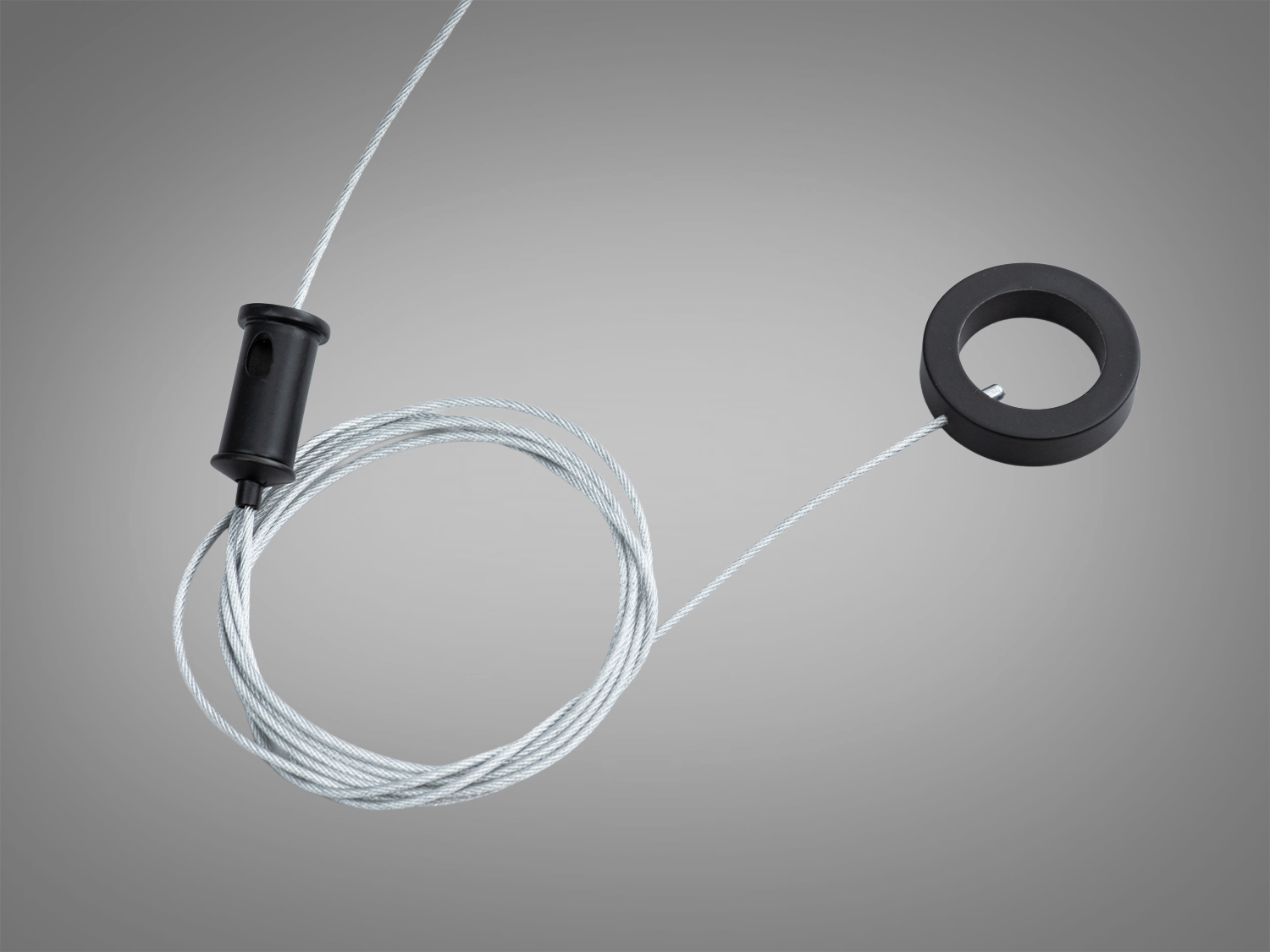 Чорне металеве кільце-підвіс з тросом для круглого гнучкого силіконового профілю D22. Акуратний стельовий монтаж підвісних світлових ліній.