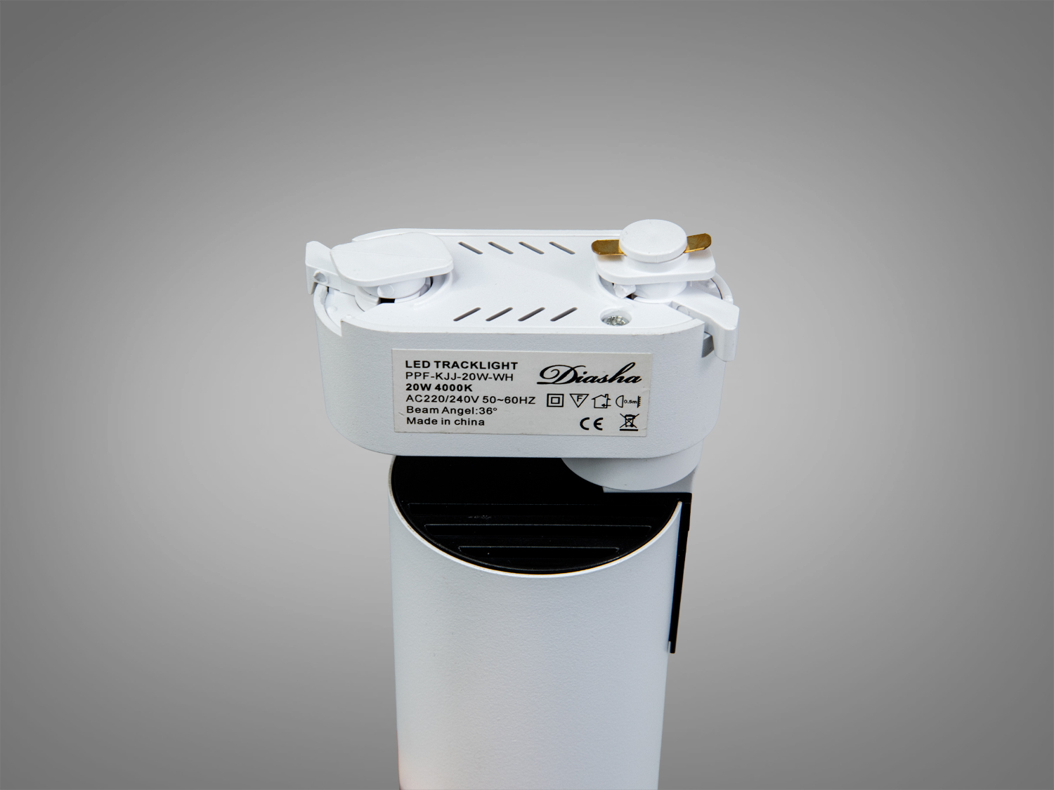 Верхня частина трекового світильника з інформацією про характеристики: 20W, 4000K, кут променя 36 градусів.