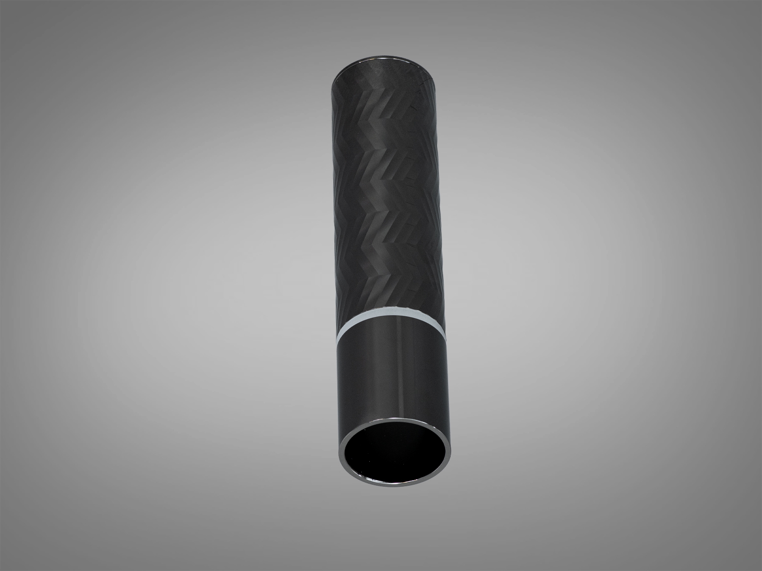 Підвісний світильник з циліндричним корпусом, чорний з геометричною текстурою. Ідеальний для акцентного освітлення в сучасних просторах.