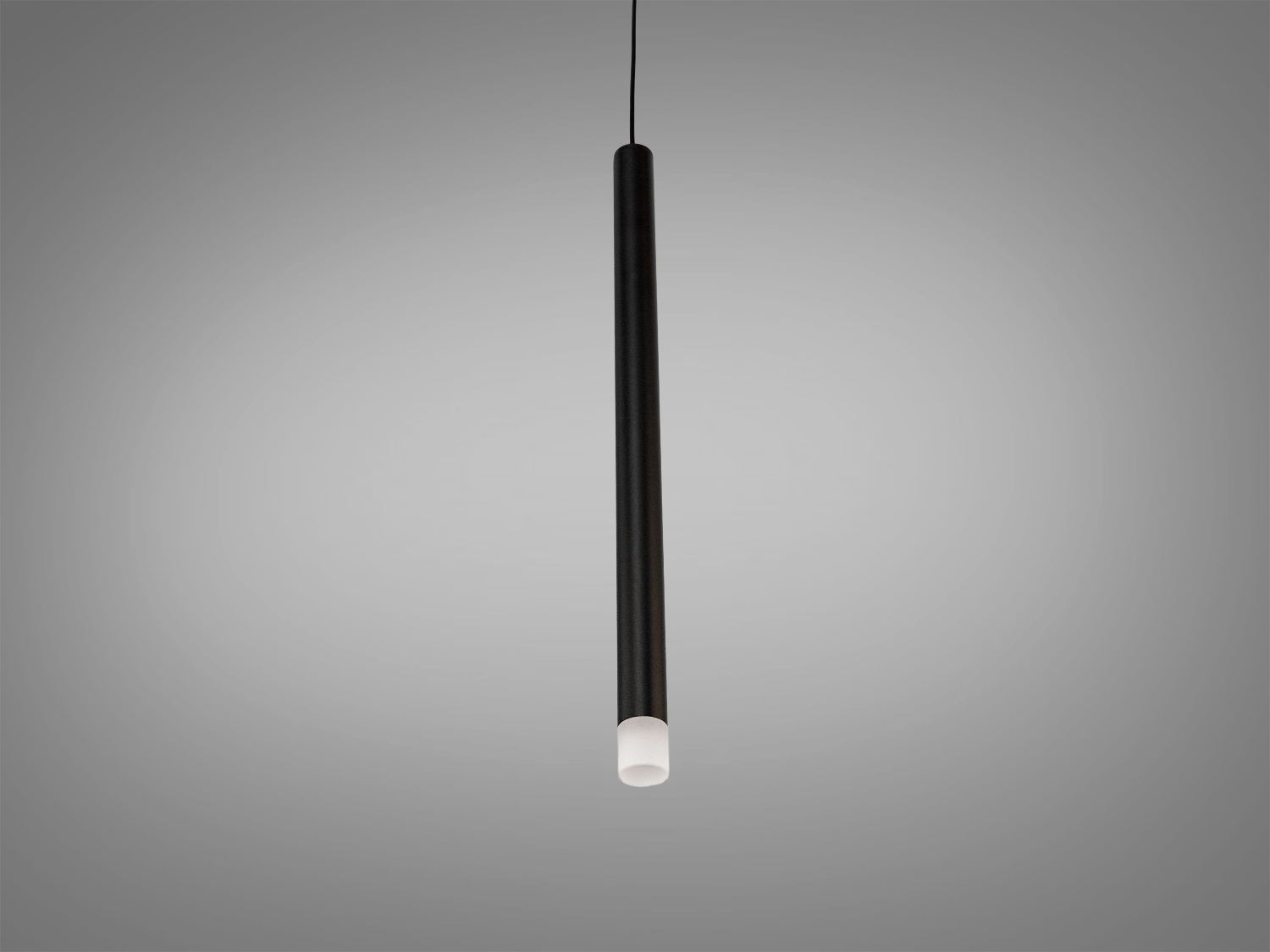 Чорний циліндричний світильник з матовим покриттям, підвісний монтаж, ідеальний для локального освітлення в робочих зонах.