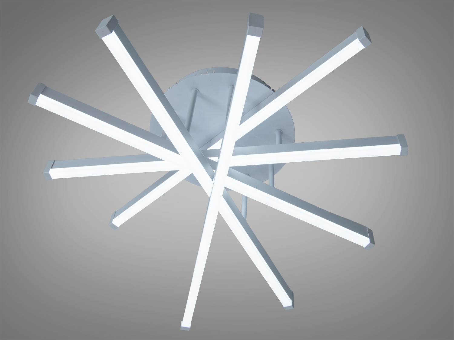 Сучасний стельовий світильник з білими LED-смугами, розташованими радіально, створює динамічний ефект. Підходить для мінімалістичного інтер′єру.