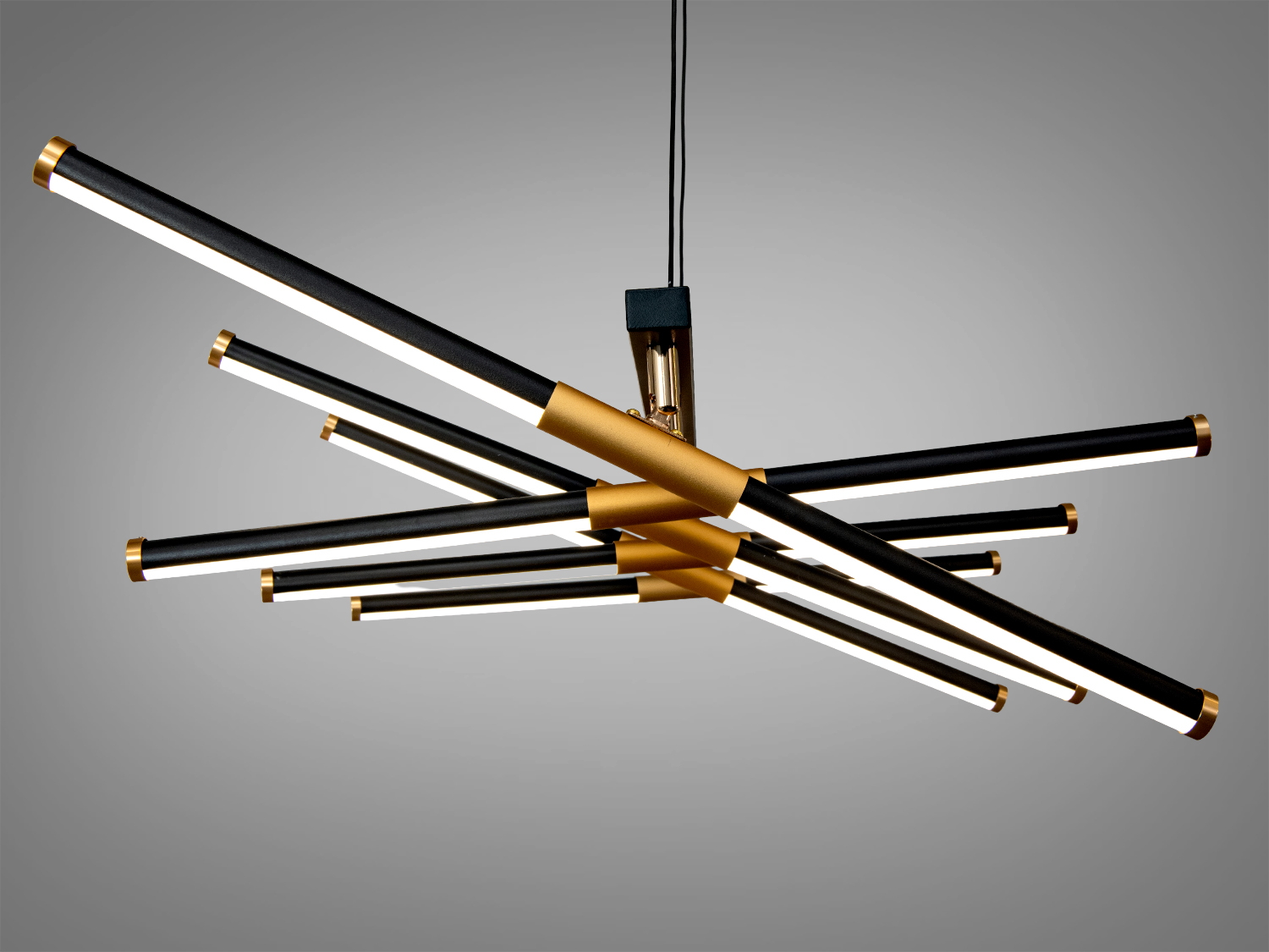 Стельовий світильник з перехресними LED лампами, чорний і золотий стиль, ідеальний для вітальні.