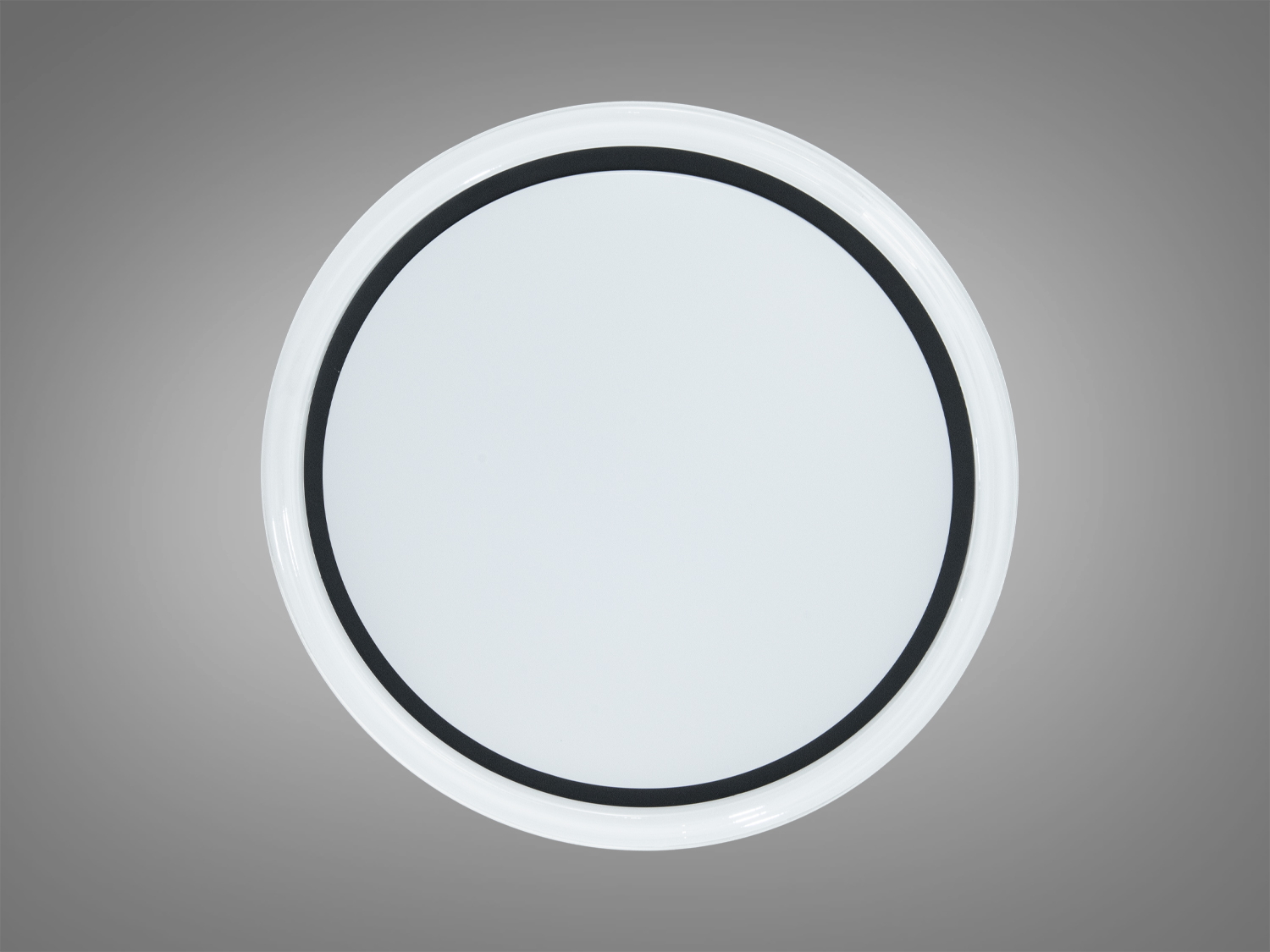 Кругла лампа для монтажу на стелю, підходить для спальні. Має чорний обідок, що додає стильного вигляду.